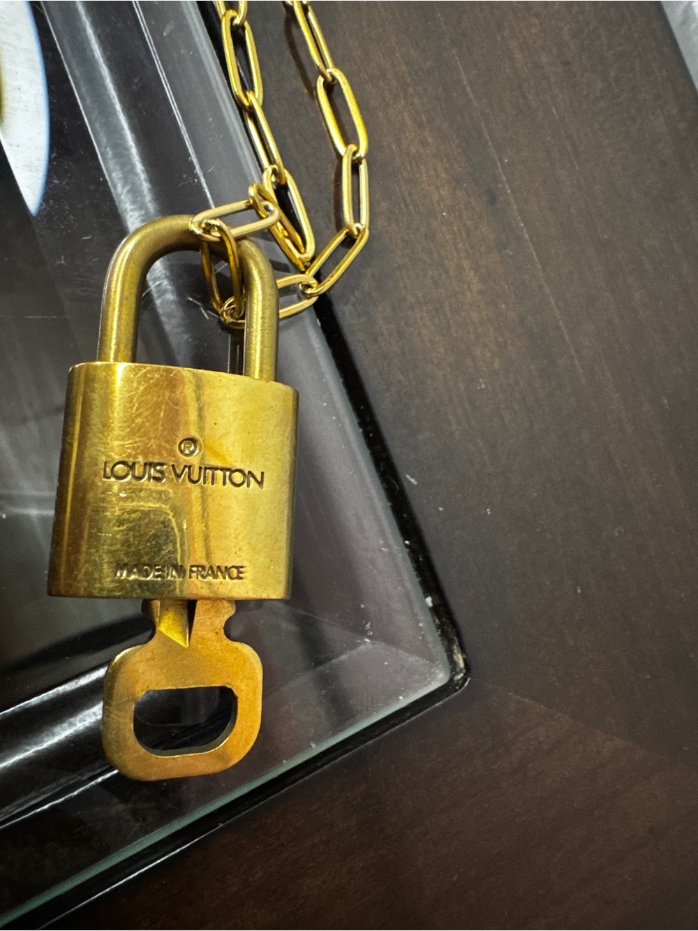 Louis Vuitton Gold Padlock 314